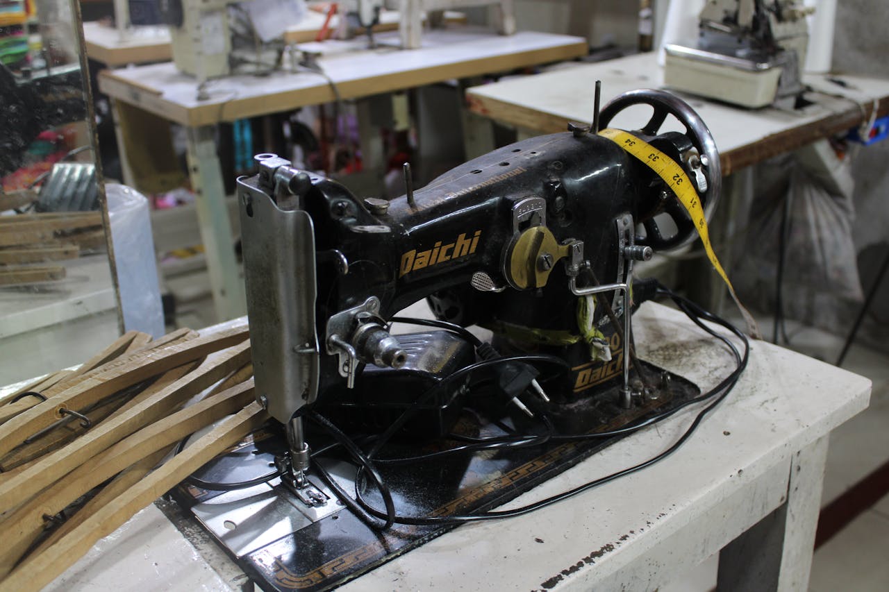 vintage-sewing-machine-in-a-tailor-s-workshop-35216773